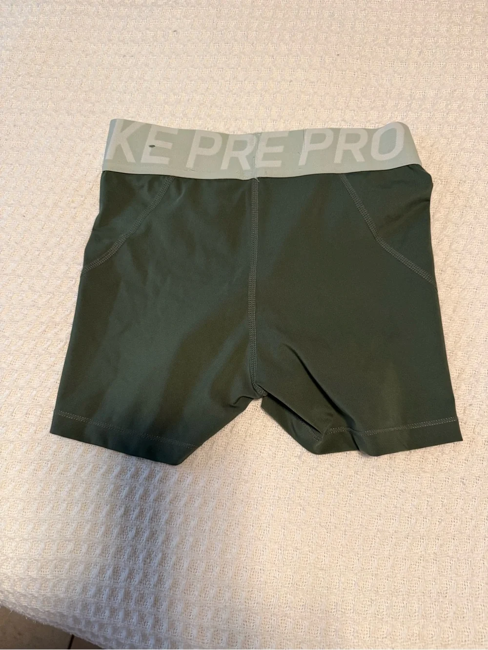 Nike Pro Olive Green Women's Training Shorts with White Logo Waistband